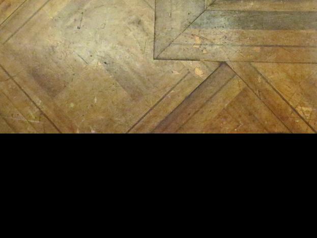 Detalle de parquet y baldosas del primer piso